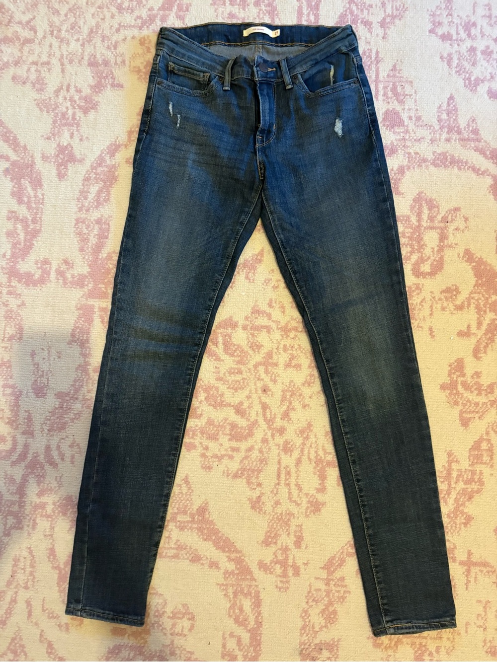Levi's Dark Blue Skinny Jeans with Subtle Distress